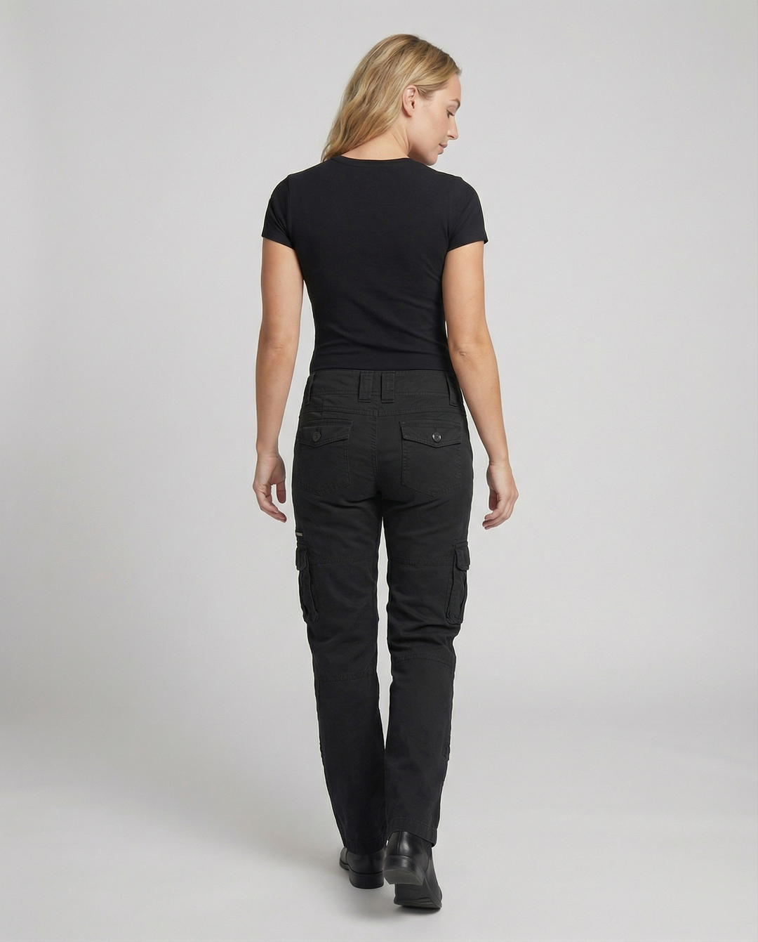 Women's adventure cargo pants featuring multiple secure pockets, great for hiking & travel essentials.