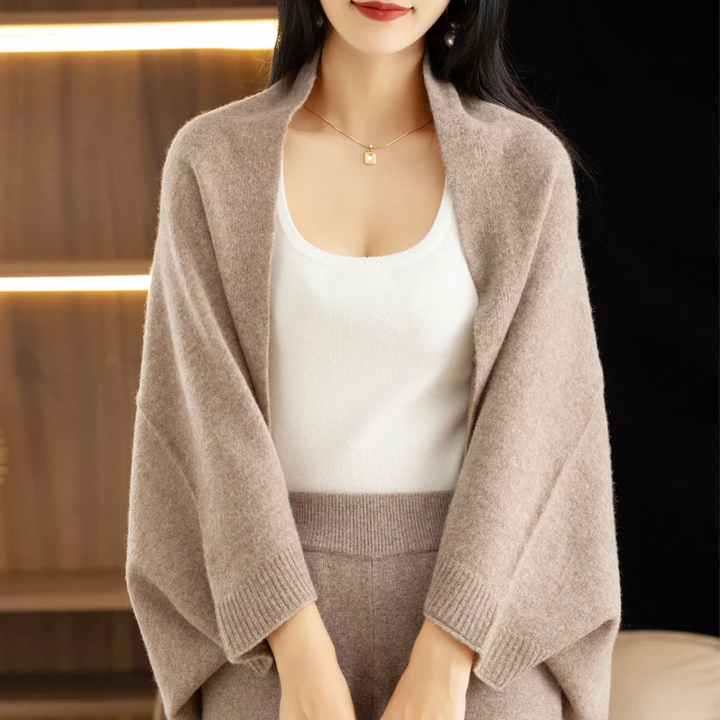 Fashionable women's multi-way cascade shawl wrap, a chic & versatile accessory.