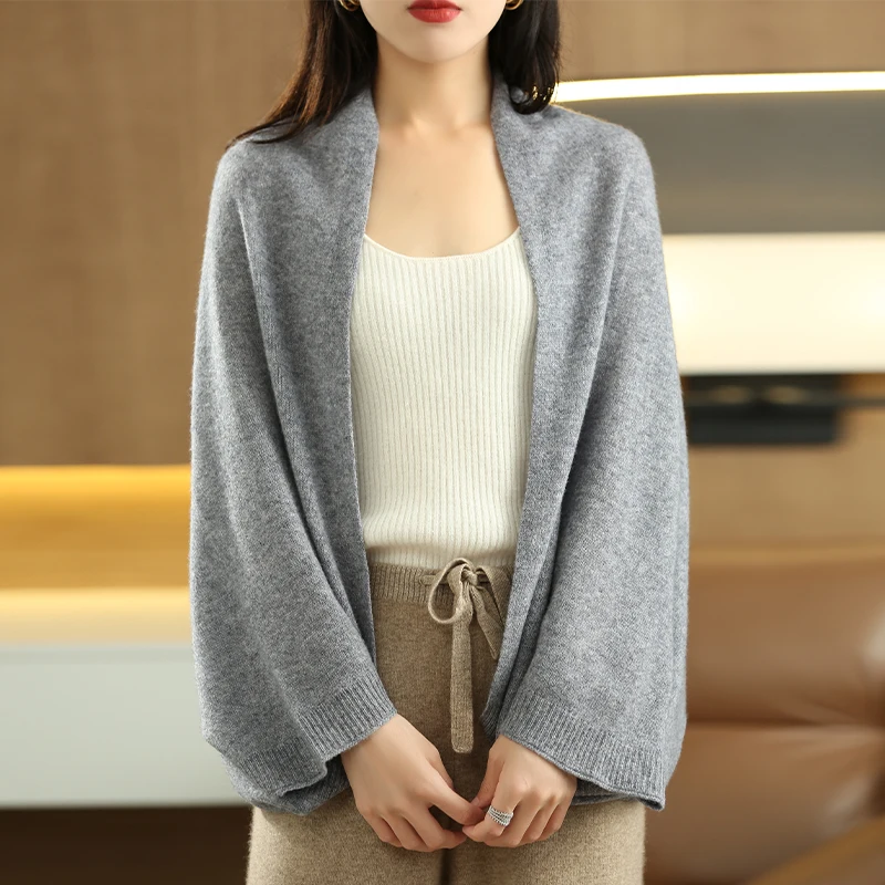 Elegant women's versatile wrap, ideal as a layering accessory for warmth & style.