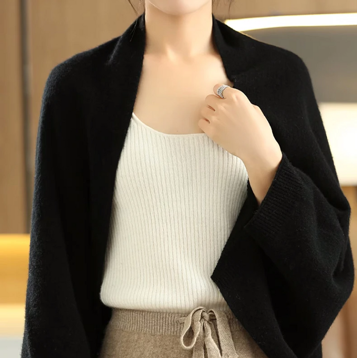 Stylish women's multi-way wrap & scarf, perfect for cozy and elegant layering.