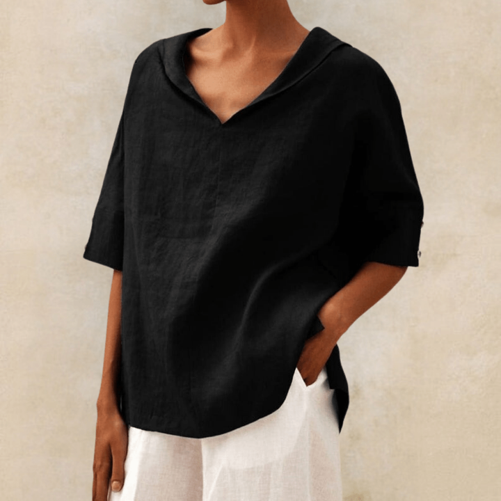 Effortless women's fashion: a versatile collared V-neck tunic top with a relaxed, comfortable fit.