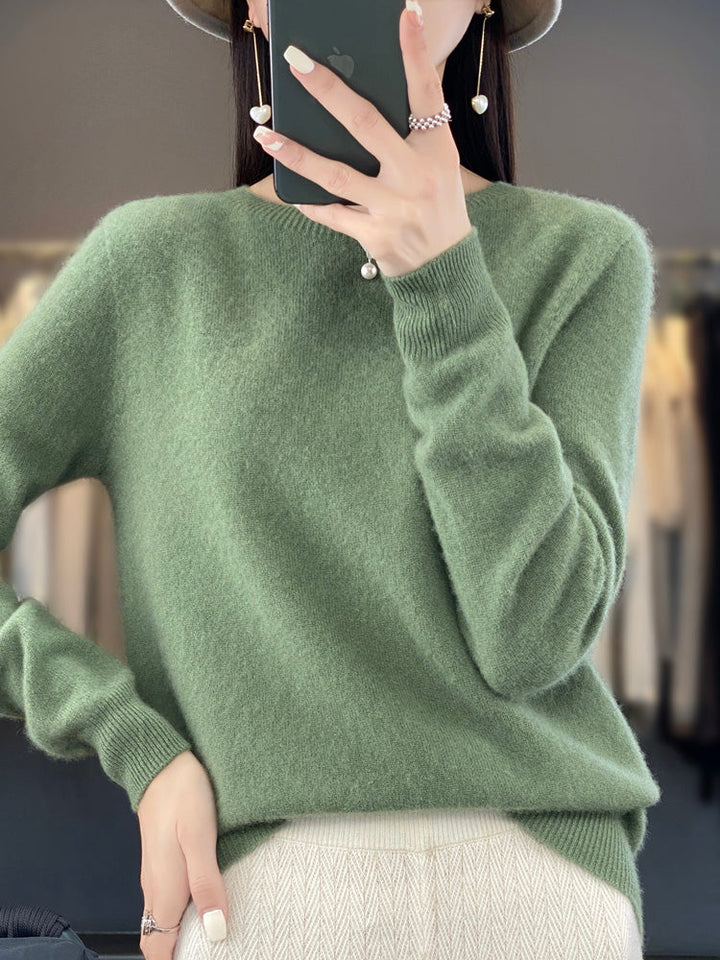 Women's versatile cream crew neck sweater for everyday comfort & timeless style.