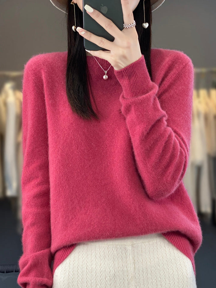 Fall essential women's knit pullover, offering warmth and timeless appeal.