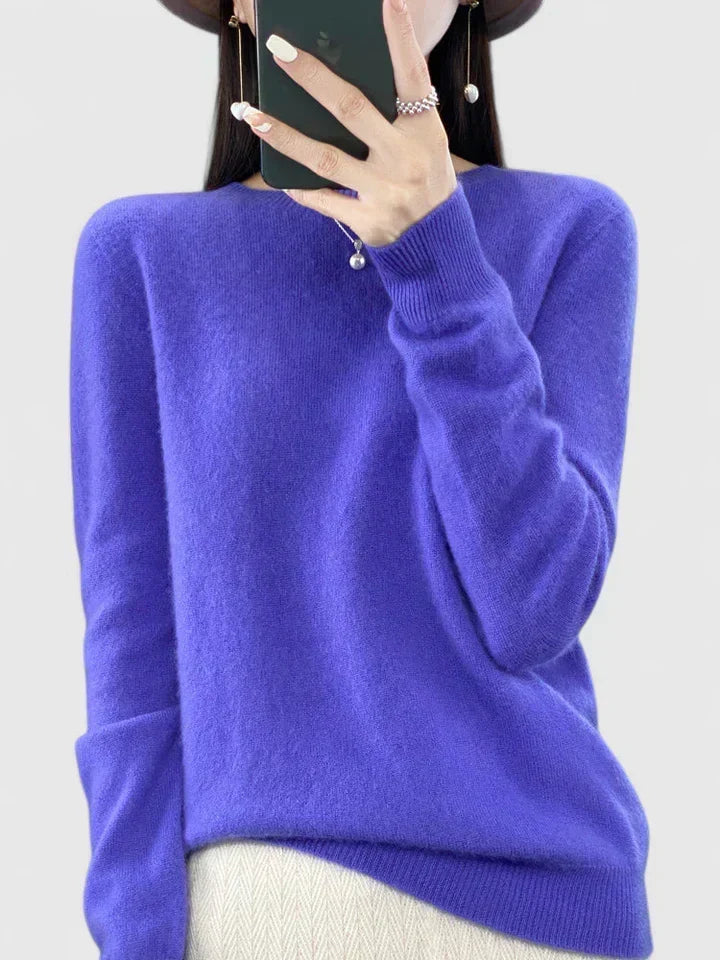 Soft knit women's sweater, a versatile long sleeve piece for everyday wear.
