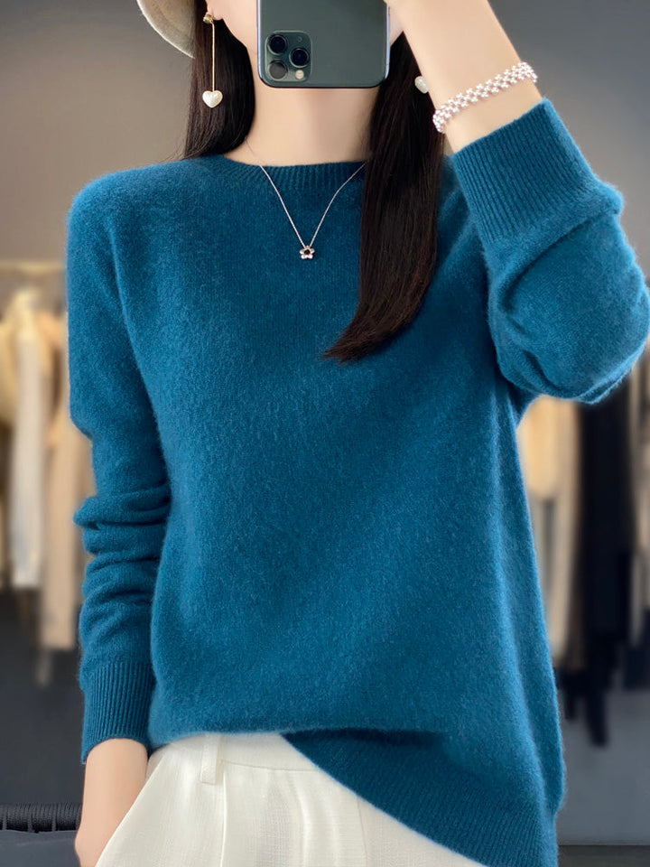 Soft knit women's pullover in a relaxed fit, perfect for fall essential wear.