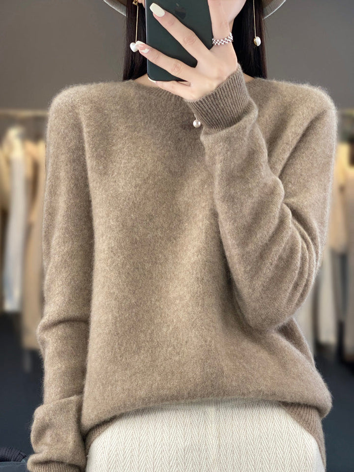 Timeless style women's crew neck sweater, perfect for fall and winter seasons.