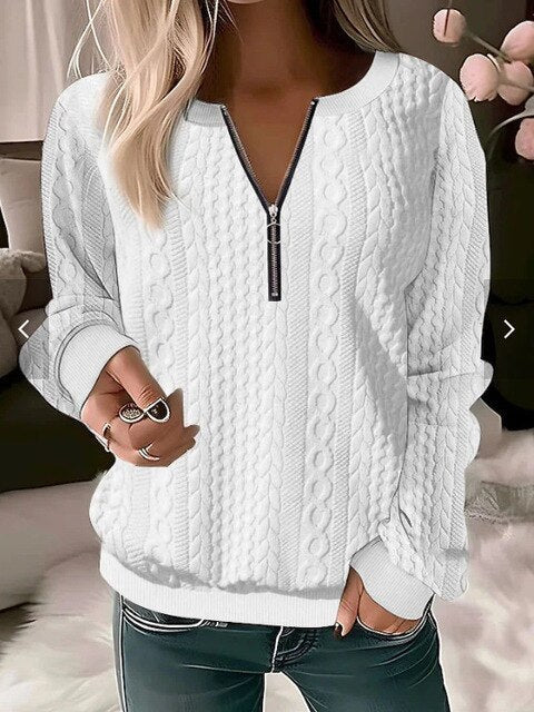 Trendy women's jacquard knit round neck sweater. Stylish pullover for versatile autumn fashion looks.