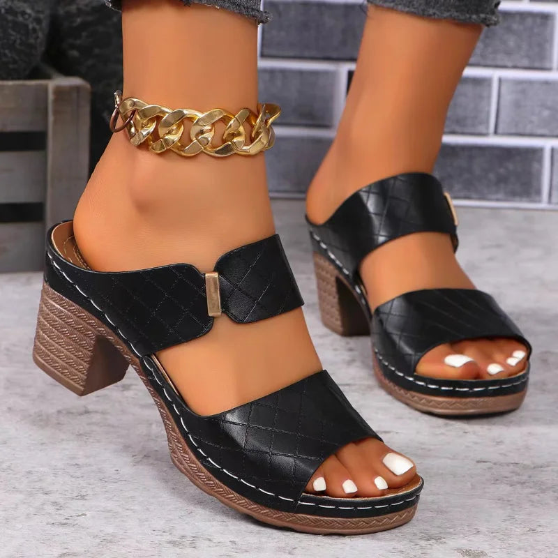 Elegant women's leather block heel sandals. Effortless slip-on footwear, perfect for versatile summer outfits.
