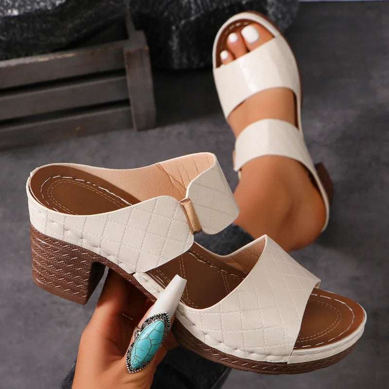Chic women's leather block heel sandals, ideal for casual and dressy summer occasions. Comfortable & stylish.