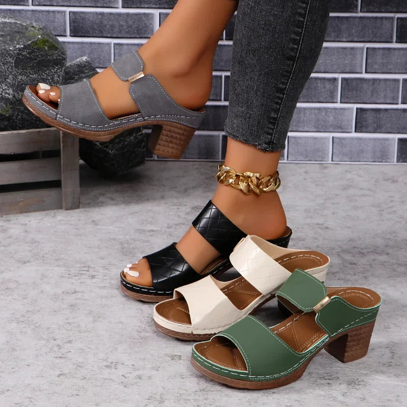 Slip-on women's versatile block heel sandals. Comfortable leather footwear for elegant and casual summer fashion.