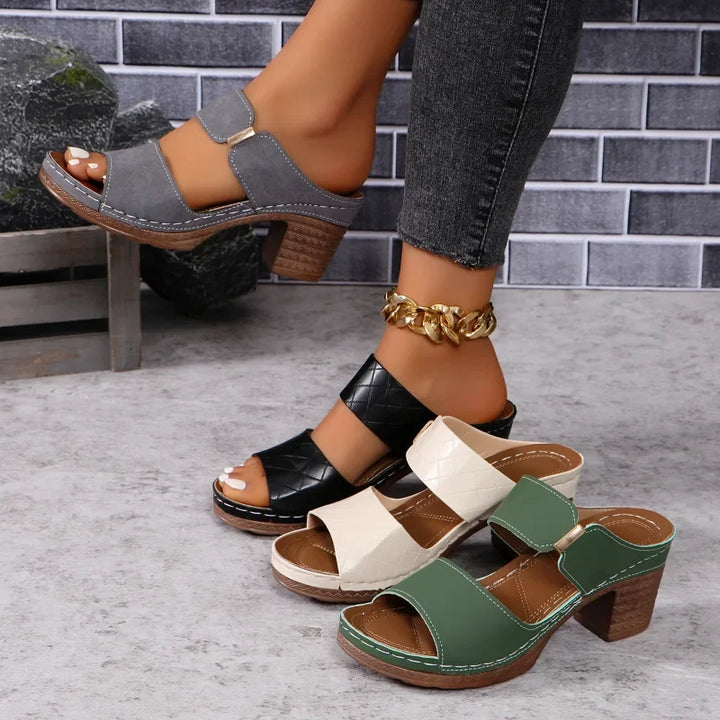 Slip-on women's versatile block heel sandals. Comfortable leather footwear for elegant and casual summer fashion.