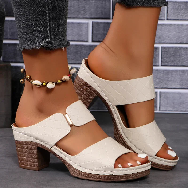 Heeled women's leather sandals with a stable block heel. Comfortable & stylish for all your summer fashion needs.