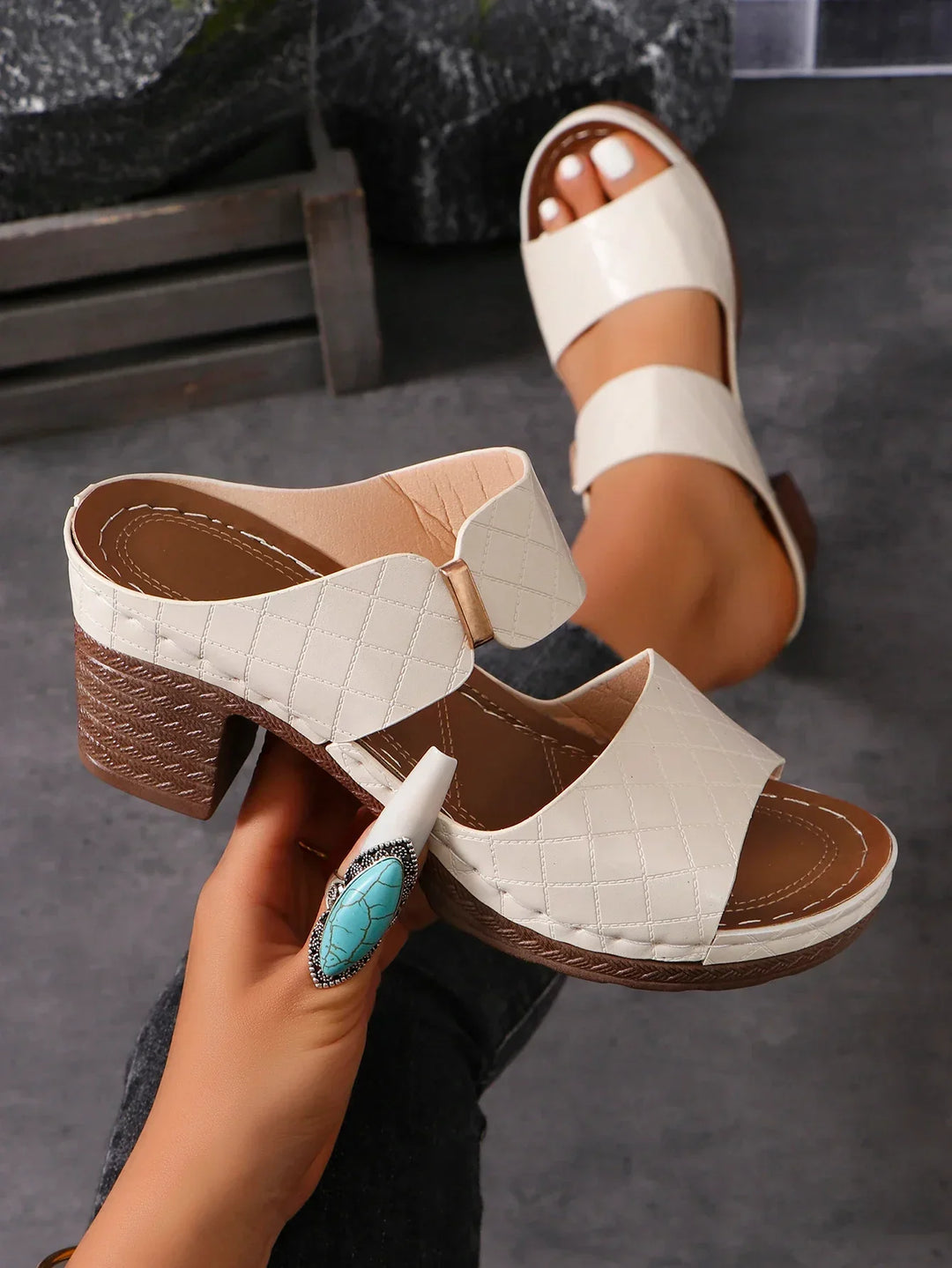 Women's versatile block heel leather sandals. Elegant, comfortable slip-on shoes for effortless summer style.