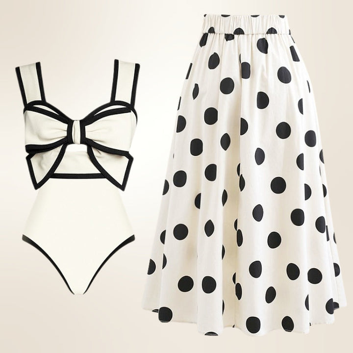 Women's versatile one-piece swimsuit with elegant skirt cover-up for chic beach and resort wear.