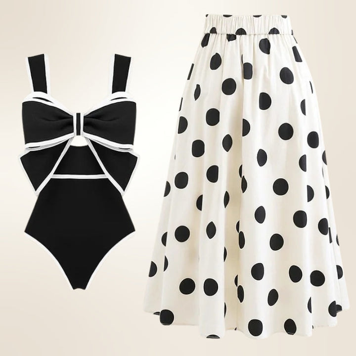 Elegant women's one-piece swimsuit featuring a flattering skirt cover-up, perfect versatile beachwear.