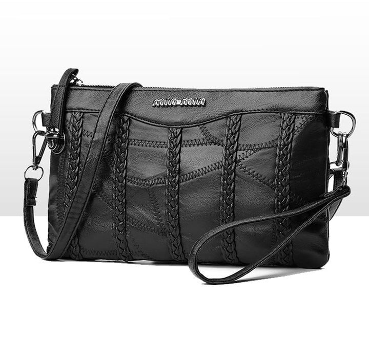 Textured PU leather on a women's versatile crossbody clutch bag, highlighting the durable and modern material.