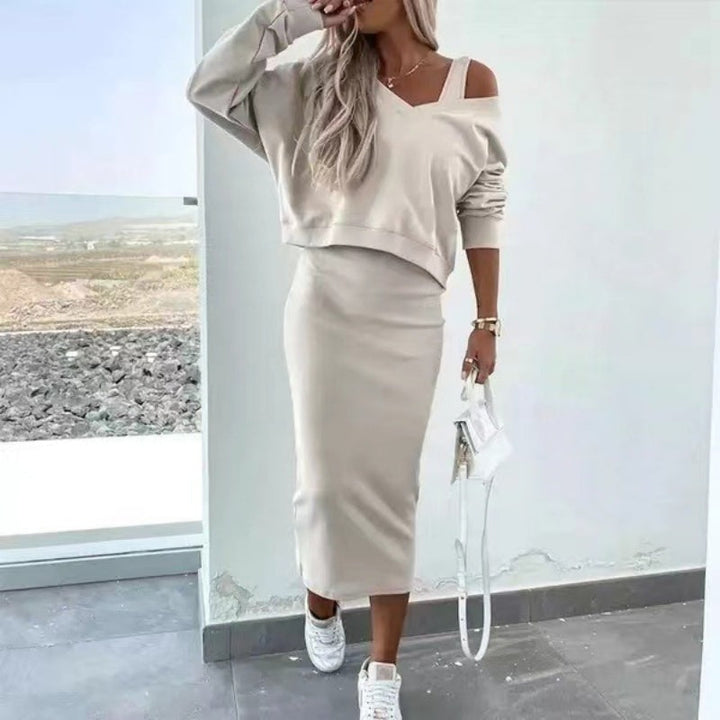 Modern women's versatile sweater set with sleeveless dress. Chic, comfortable outfit for year-round style.