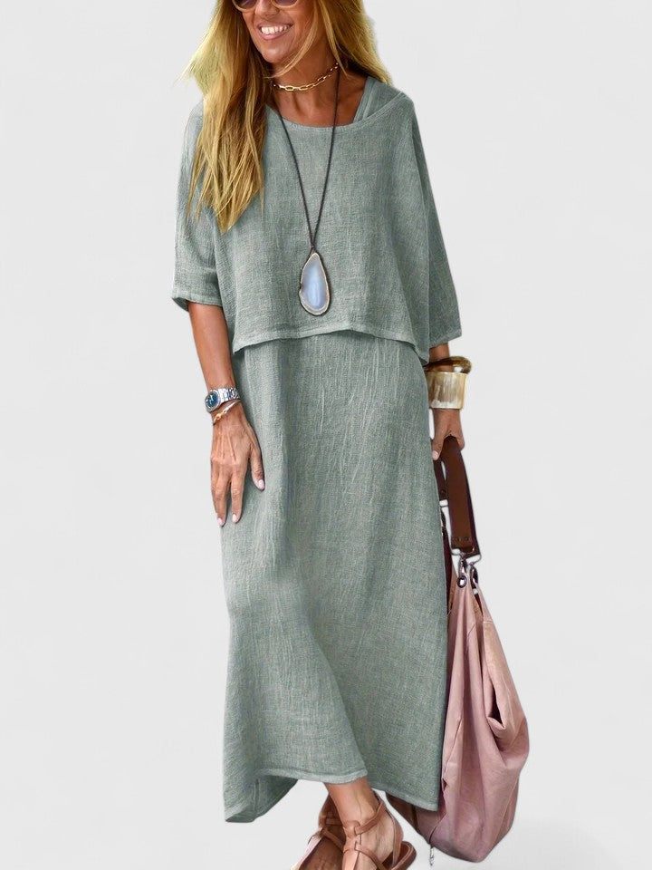 V-neck short sleeve top & relaxed fit maxi skirt form this women's two-piece summer casual dress.