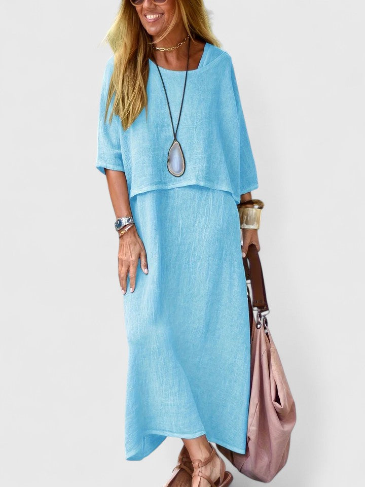 Elegant women's two-piece maxi dress with short sleeve top, offering a versatile and relaxed summer style.