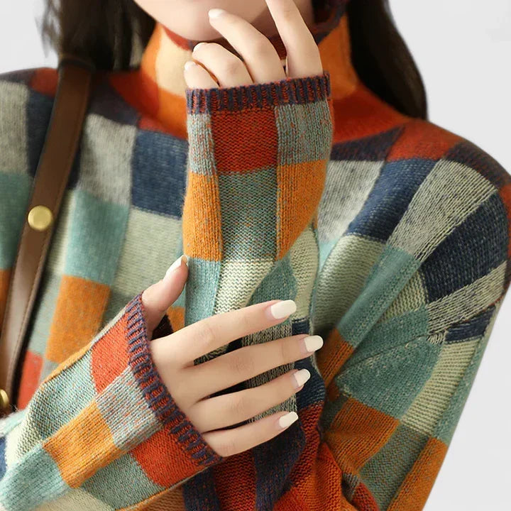 New arrival: Women's colorful check pattern sweater, a vibrant casual top for autumn style.