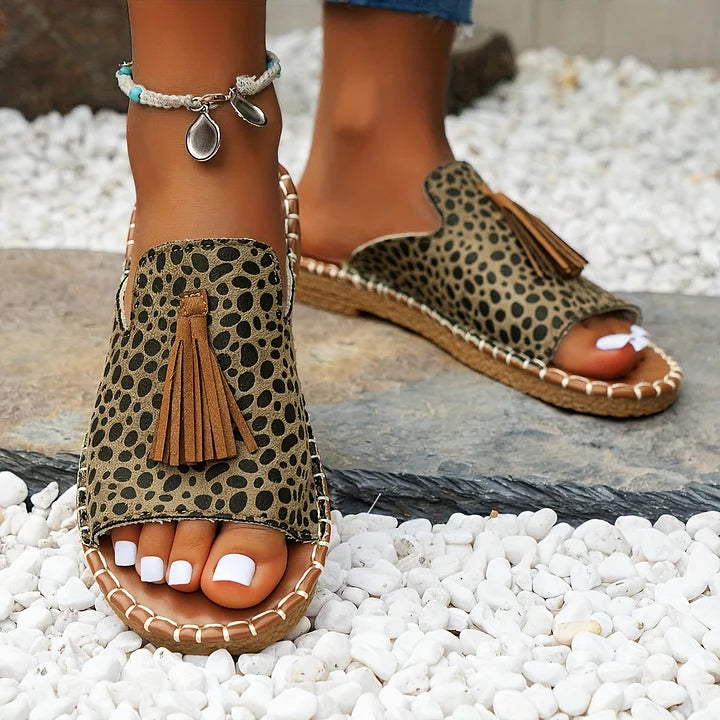 Fashionable vibrant slip-on flat sandals for women, offering all-day comfort.