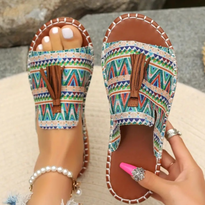 Ultra-comfortable women's flat sandals, designed for all-day wear & effortless style.