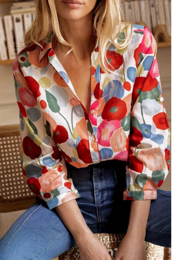 Women's vibrant floral button-down blouse with a relaxed fit. Perfect for spring & summer casual or office wear.
