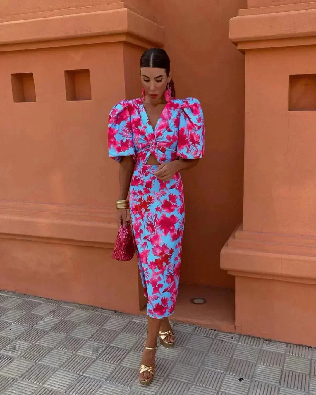 Women's vibrant floral cutout midi wedding guest dress with puff sleeves. Perfect for occasions, parties, and cocktails.