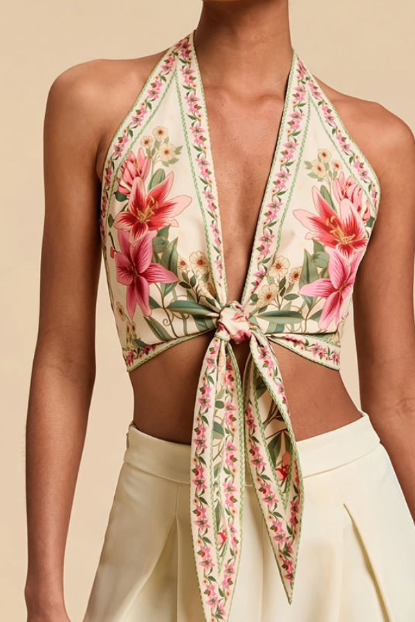 Beach-ready women's floral halter top, a vibrant sleeveless option for summer.