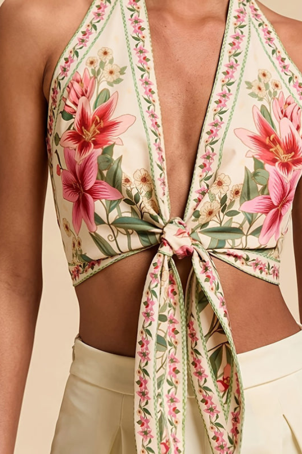 Festival-ready women's vibrant floral halter top, perfect for a stylish summer look.