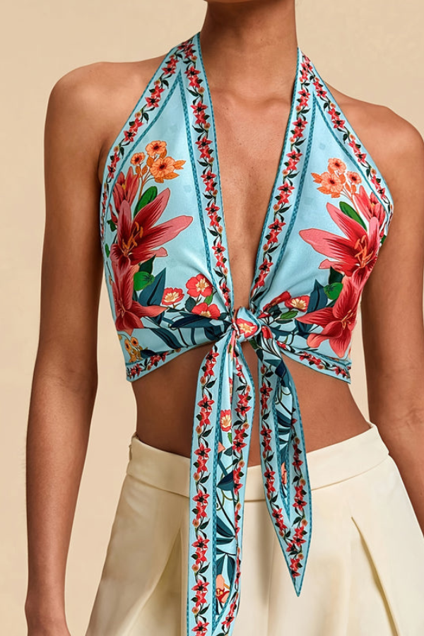 Women's top: vibrant floral print halter, perfect for summer casual wear & beach days.