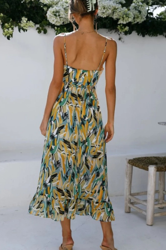 Lightweight sleeveless floral summer dress for women, vibrant print, v-neck, great for beach or vacation.