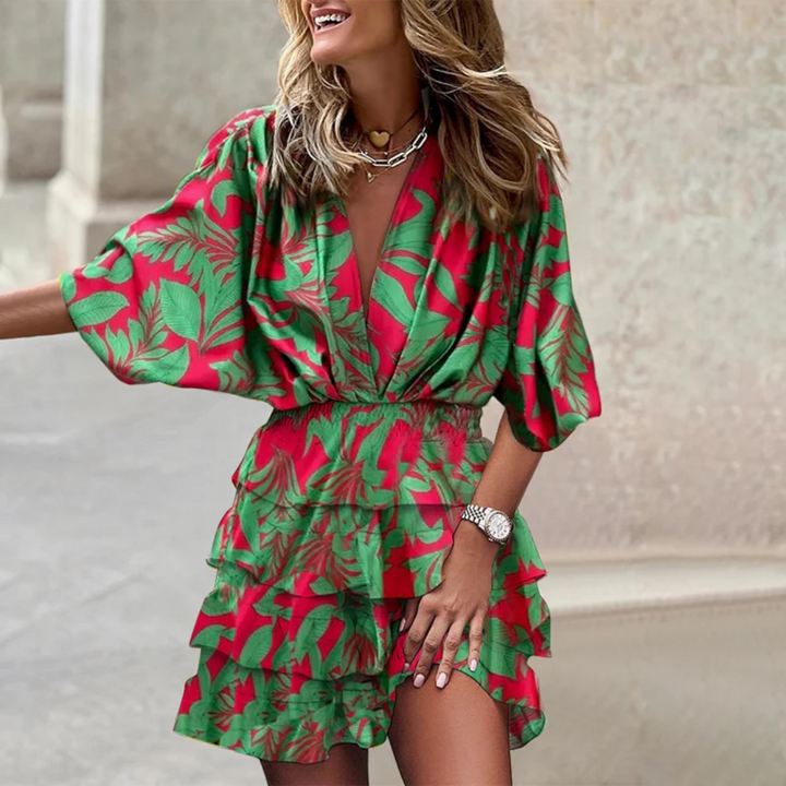 Colorful vibrant mini dress for women. Playful short summer party dress with a chic modern design.