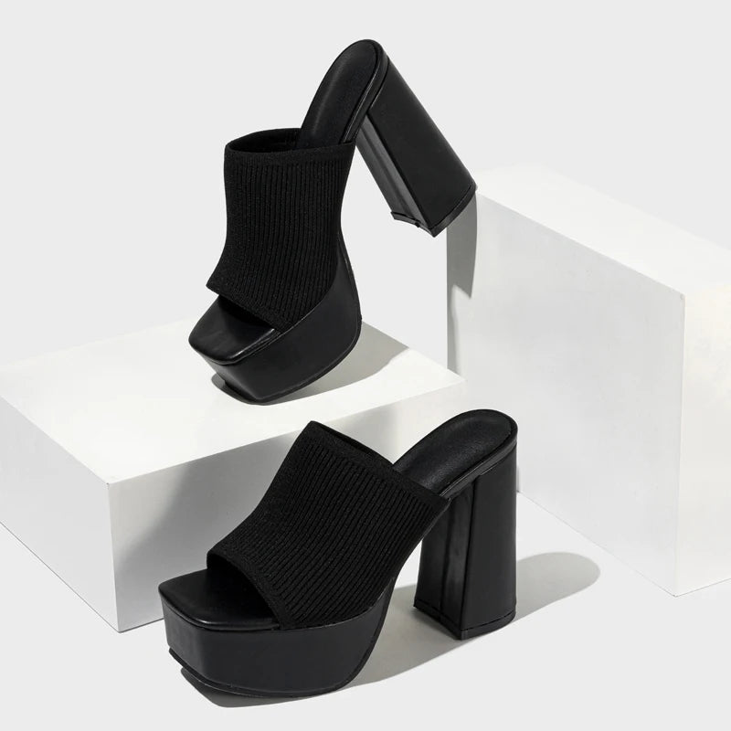 Chunky purple neon platform block heels. Vibrant Y2K women's party shoes, a retro statement.