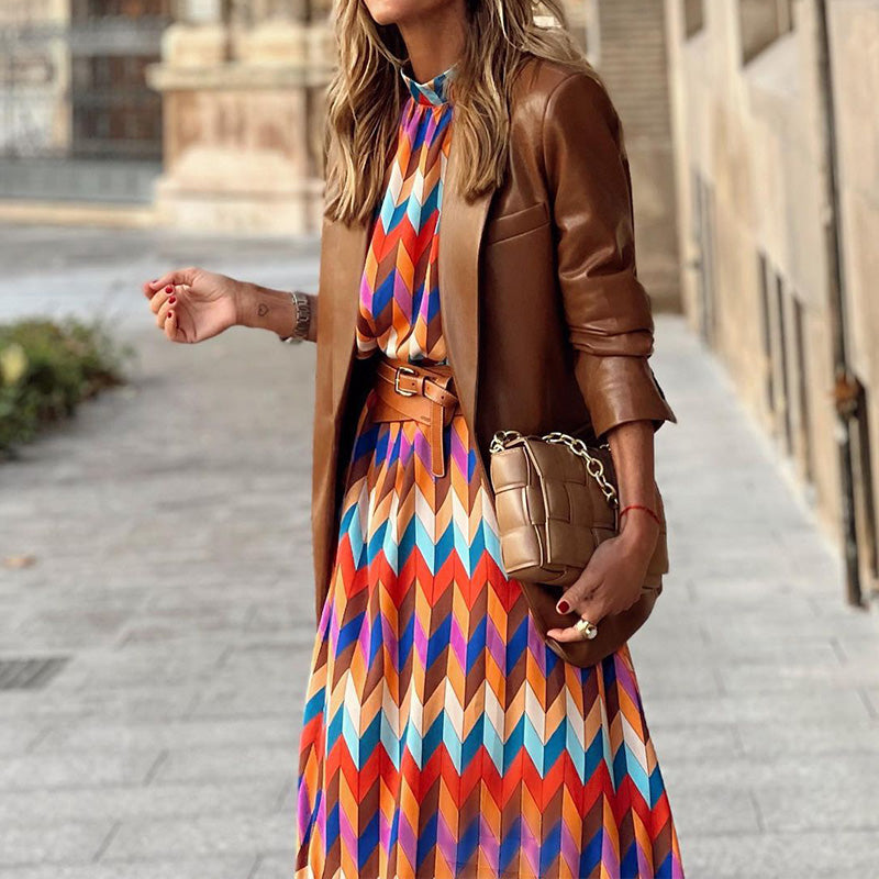 Elegant women's vibrant print midi dress, ideal for spring, beachwear or vacation. Colourful, flowy design.