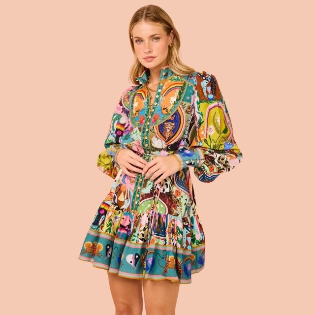 Women's vibrant print mini dress, perfect for playful summer style. Sleeveless, colorful & casual beachwear fashion.