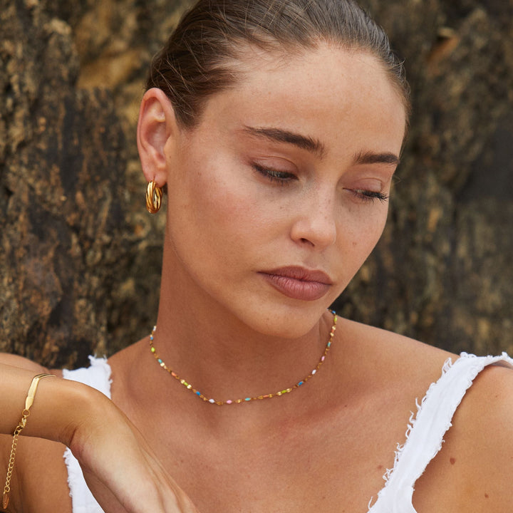 Radiant women's rainbow choker necklace, enamel design with waterproof and hypoallergenic features.