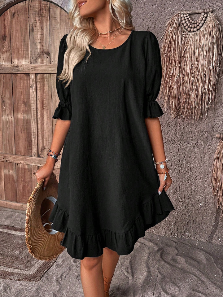 Vibrant women's casual midi dress, ideal as a summer or beach dress with a comfortable relaxed fit.