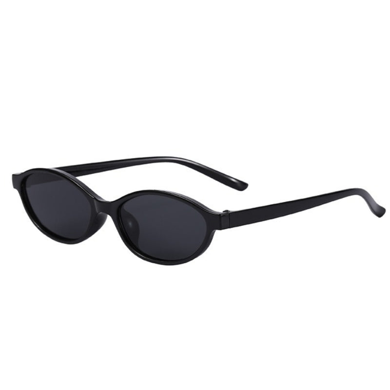 Brown women's 90s cat-eye sunglasses, stylish vintage retro accessory for eye protection with UV400 lenses.