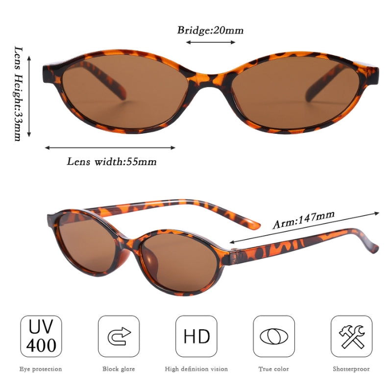 Elegant women's black 90s cat-eye sunglasses, vintage style accessory with UV400 lenses for eye protection.