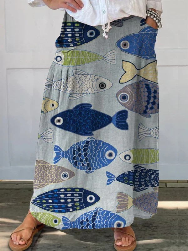 Women's vintage A-line midi skirt with unique fish art print & practical pockets, perfect for summer casual wear.