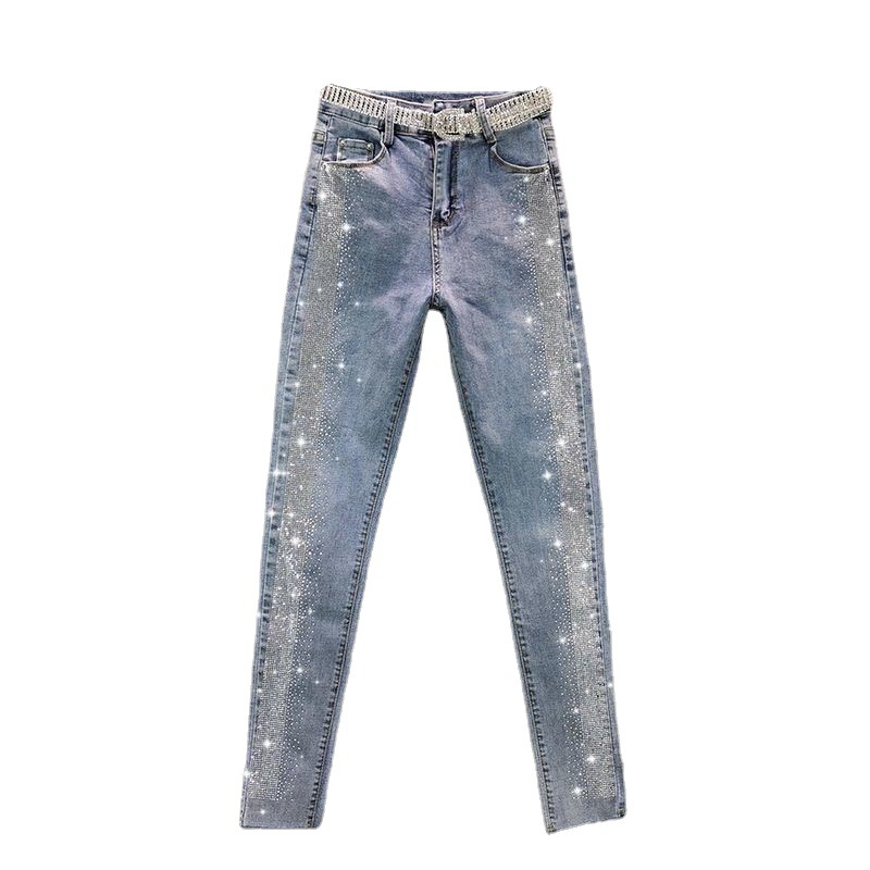 Women's vintage blue slim jeans with a flattering high waist, perfect for a timeless casual style.