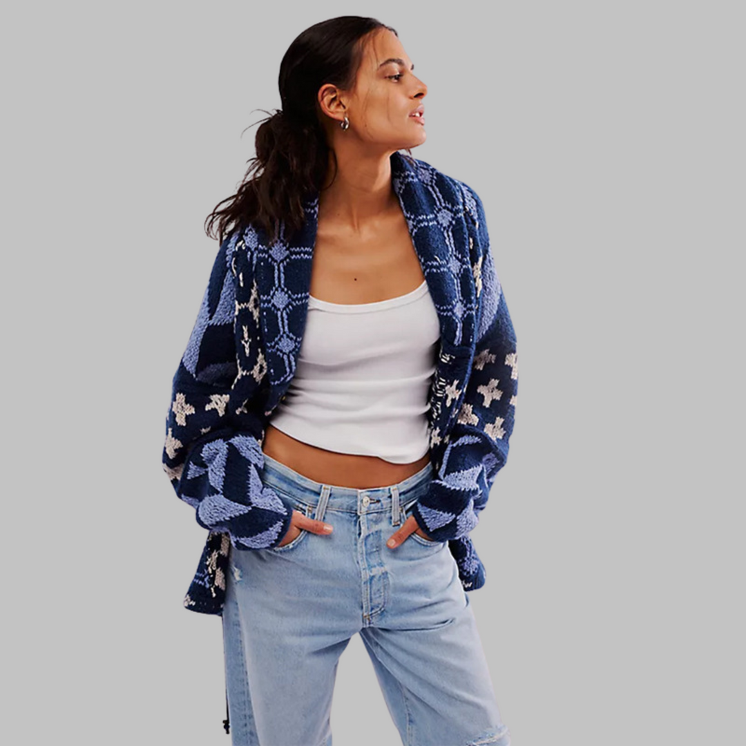 Women's vintage oversized cardigan with button detail, a warm long sleeve layering piece for fall.