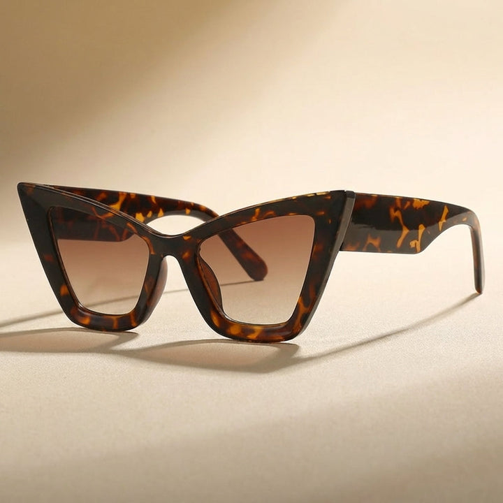 Women's Vintage Cat Eye Oversized Sunglasses with UV400 protection, fashionable eyewear.
