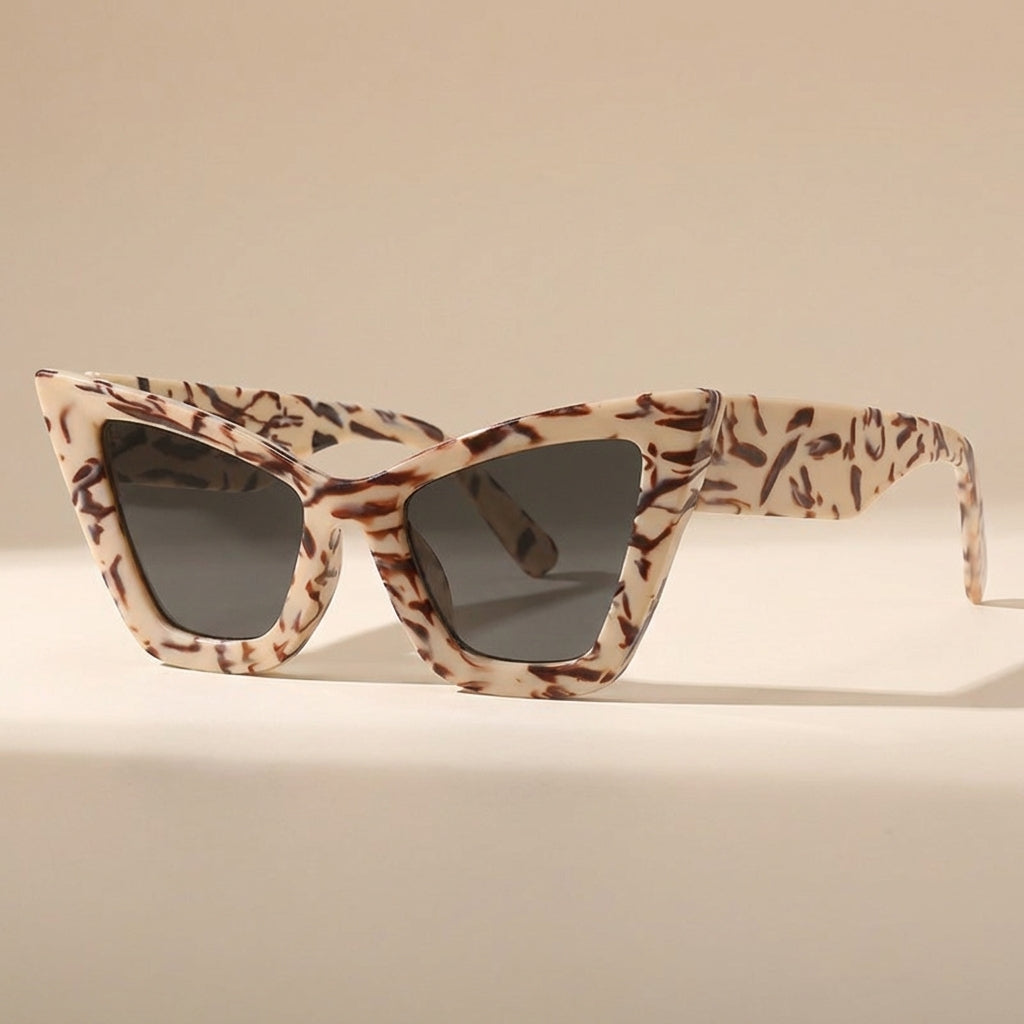 Stylish women's oversized vintage cat eye sunglasses, perfect for sun protection & fashion.