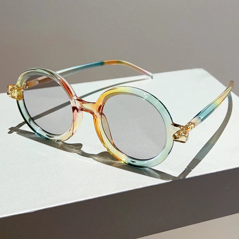 Trendy women's UV400 circular sunglasses, perfect for adding a retro touch to any outfit.