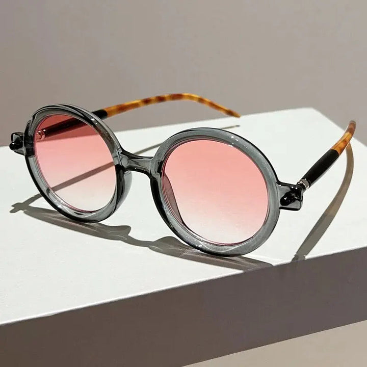 Circular retro sunglasses for women, providing fashionable style and essential UV400 eye protection.