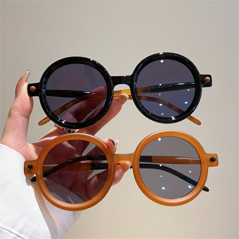 Classic women's circular acetate sunglasses, offering trendy vintage style and UV400.