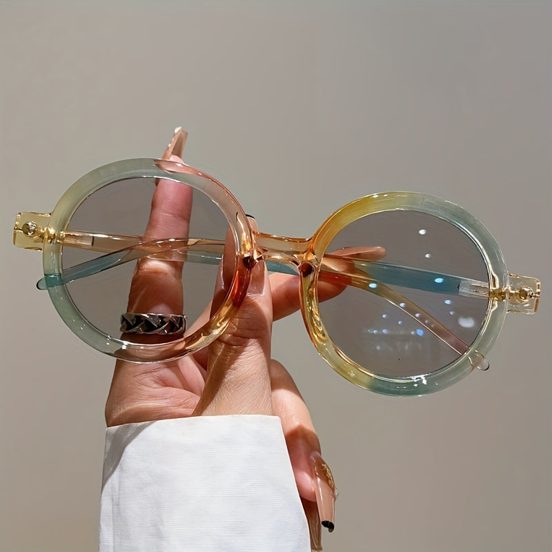 Front view: women's vintage circular sunglasses in a vibrant color, with UV400 protection.
