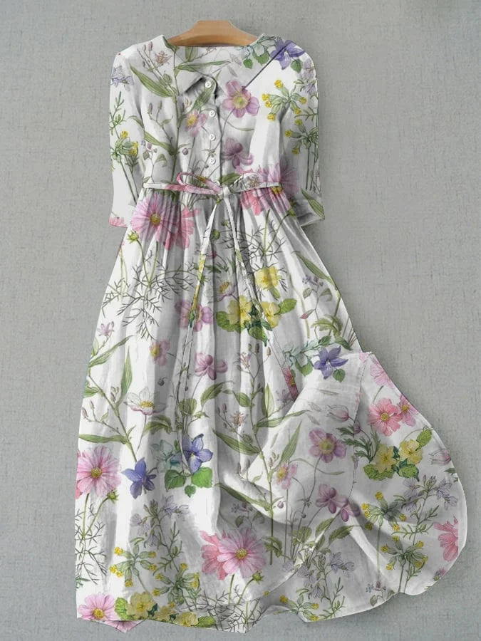 Women's vintage floral A-line dahlia summer dress with short sleeves & lace-up detail, perfect for elegant casual wear.